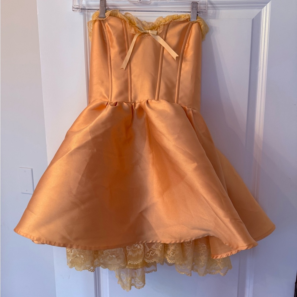 Costume bright yellow Strapless Dress with Lace Trim. Much yellower than pic.